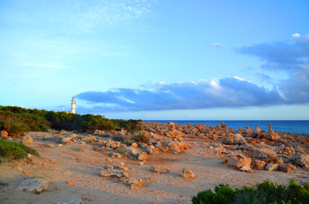 Lighthouse overlooking the Mediterranean Seaの写真素材