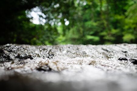 Close up of water flowing through the riverの写真素材