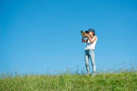 Girl playing trumpetの写真素材