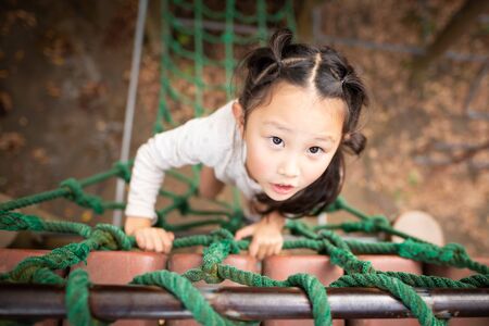 Girl playing in the parkの写真素材