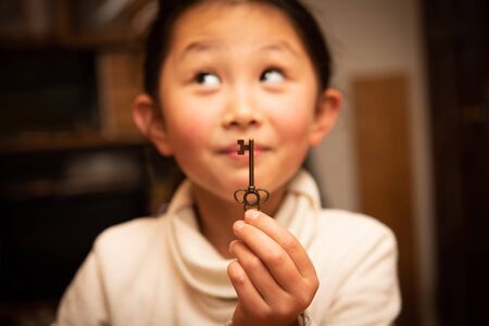 Child with a keyの写真素材