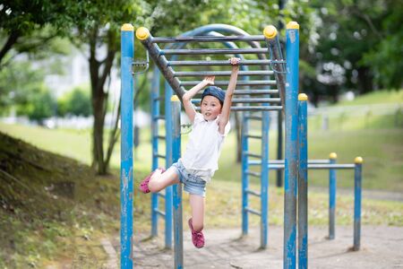 Girl playing in the parkの写真素材