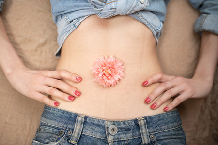 Beautiful waist of a woman in jeansの写真素材