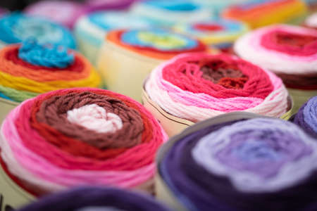 Lots of colorful yarns on displayの写真素材