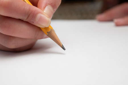 A child who writes with a pencilの写真素材