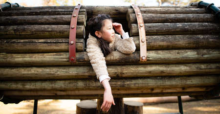 Girl playing in the parkの写真素材