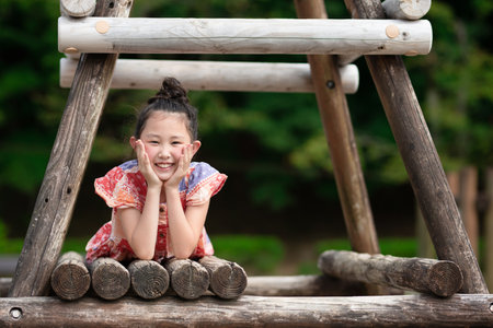 girl playing in the parkの写真素材