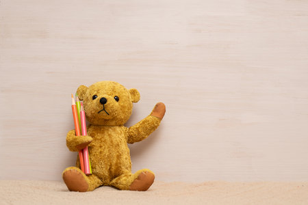 teddy bear with colored pencilsの写真素材