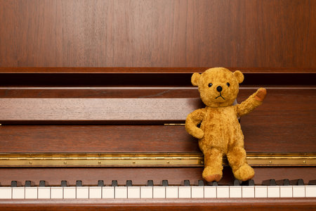 piano and a teddy bearの写真素材