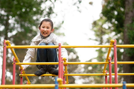 Girl playing in spring park