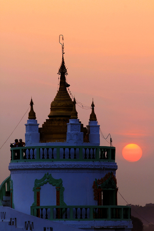 Temple with sunset in Myanmarの写真素材