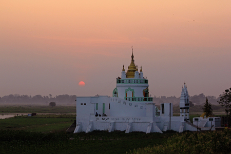 Temple with sunset in Myanmarの写真素材