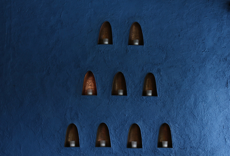 Blue walls, candles in the little box.の写真素材