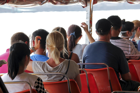 Orange chair on a passenger boatの写真素材