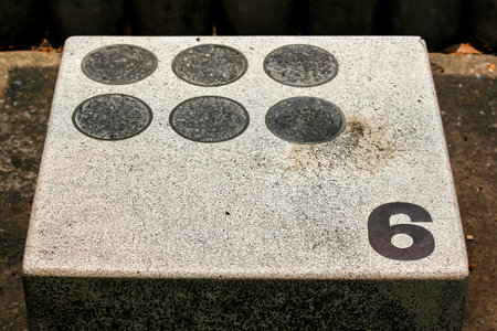 Old mortar platform for jumping into the pool.
