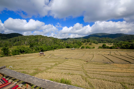 Mountains, the sky, and dry fields.の写真素材