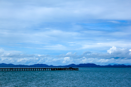 The bridge stretches to the sea.の写真素材