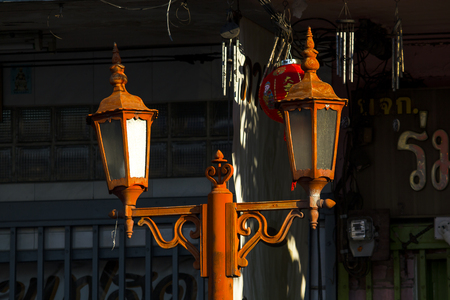 Old red lamp on the street.の写真素材
