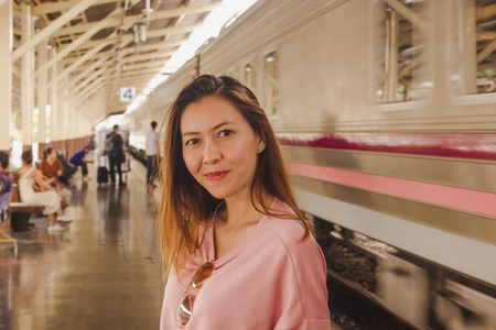 Women standing with trainの写真素材