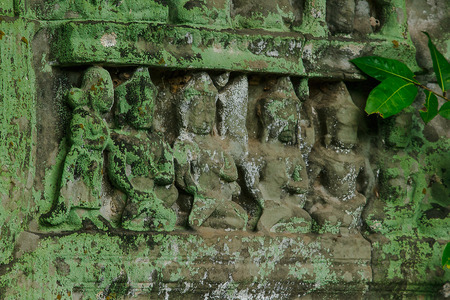 Stone carvings in the old castle of Cambodiaの写真素材