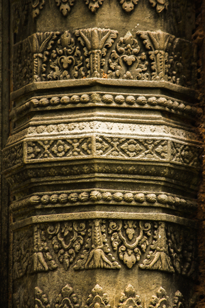 Stone carvings in the old castle of Cambodiaの写真素材