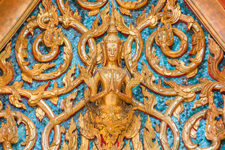 A pattern that is unique to Thailand on a temple wall.の写真素材