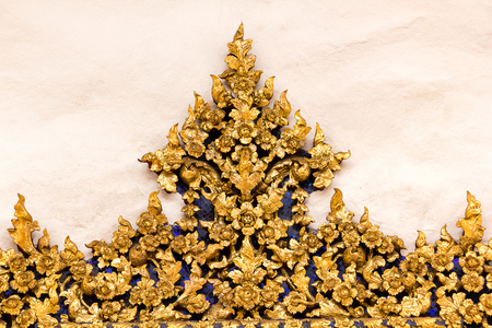 A pattern that is unique to Thailand on a temple wall.の写真素材
