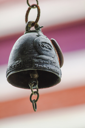 Small brass bells are commonly hung in Thai temples.の写真素材