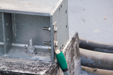 Installing the ground wire system with the steel frame of the transmission poleの写真素材