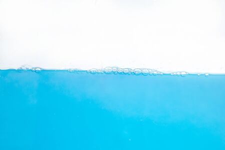 Water Surface Splash and bubbles . on white background.の写真素材