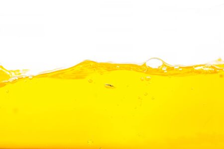 Orange water splash, Orange  Water Surface Splash and bubbles on white background.の写真素材