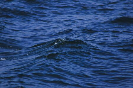 Sea water splashes, splashes of waves, views of the sea,close up the sea water surfaceの写真素材