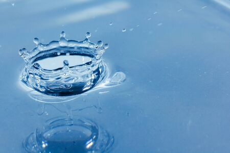 Water droplets, Blue water drops splashes. Drop water close-up, Blue water drop macroの写真素材