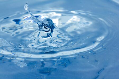 Water droplets, Blue water drops splashes. Drop water close-up, Blue water drop macroの写真素材