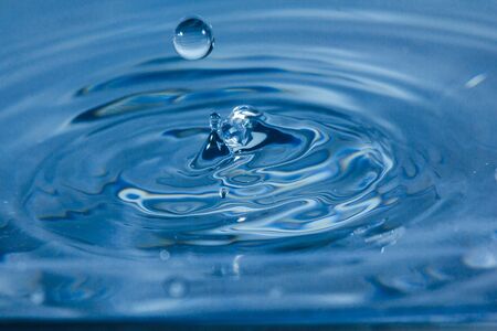 Water droplets, Blue water drops splashes. Drop water close-up, Blue water drop macroの写真素材