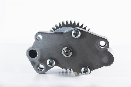 Old motorcycle spare parts on a white background. Motorcycle parts that are damaged