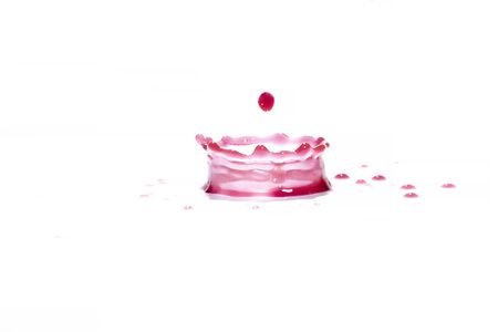 Red water splashes On a white background, photography. Red water splashes.の写真素材