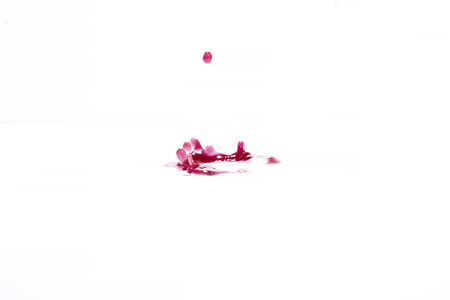 Red water splashes On a white background, photography. Red water splashes.の写真素材