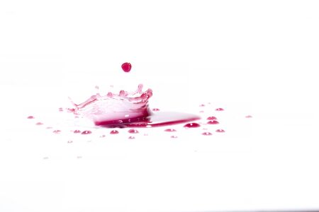 Red water splashes On a white background, photography. Red water splashes.の写真素材