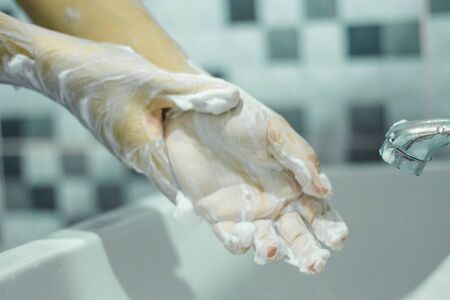 Wash your hands with soap to prevent covid 19, wash your hands to prevent epidemics.の写真素材
