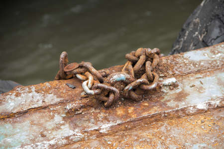 Rustic old iron chain, old iron chain used to hang fastenの写真素材