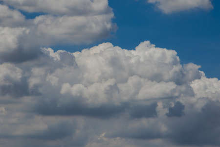 Large white clouds in the sky , Clouds and sky background, clouds and sky wallpapersの写真素材