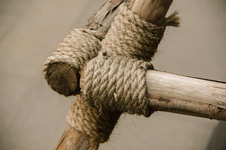 Manila Rope bound to dry wood , Rope tied to many pieces of woodの写真素材