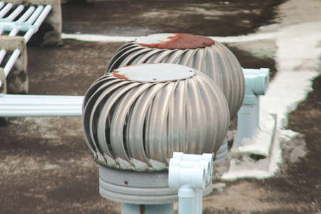 Ventilator installed outside the building on the roof and roof, relying on natural wind force. Ventilate the hot airの写真素材