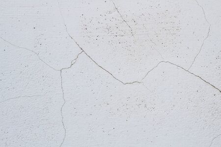 white wall with cracksの写真素材