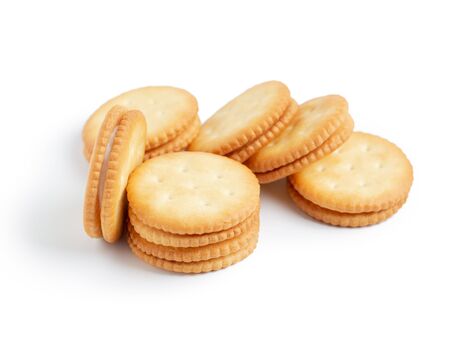 Dry cracker cookies isolated on white background.の写真素材