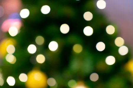Bokeh of light spot on christmas tree.の写真素材