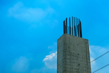 Photo of under constructed pillar with blue sky