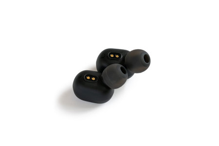 A pair of rechargeable ear-plug headphone isolated on white background