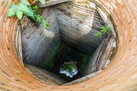 Water at the bottom of the artesian wellの写真素材